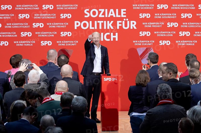 Berlin, Germany - 30 November 2024: Olaf Scholz, Federal Chancellor and lead candidate of the SPD for the 2025 federal election, cheers to supporters after his speech in the Willy Brandt House during the so-called election victory conference at the start of the federal election campaign