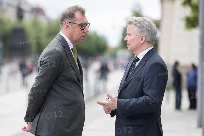 Oleksii Makeiev (Ambassador of Ukraine) and Konrad Arz von Straussenburg (German diplomat) talk after the silent commemoration of the 80th anniversary of the end of the Second World War in front of the Neue Wache, the central memorial of the Federal Republic of Germany for the victims of war and tyranny, Berlin, 8 May 2025