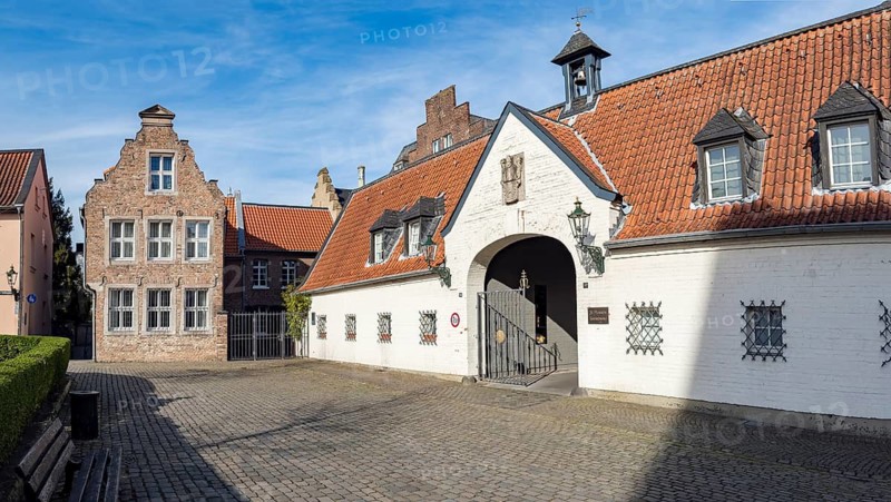 View from Marienplatz Suitbertusplatz Suitbertus-Stiftsplatz on the left Gimborn house dating from 1703, center to right gate building from the former entrance gatehouse access to the historic former St. Mary Hospital in Kaiserswerth, Düsseldorf, Germany