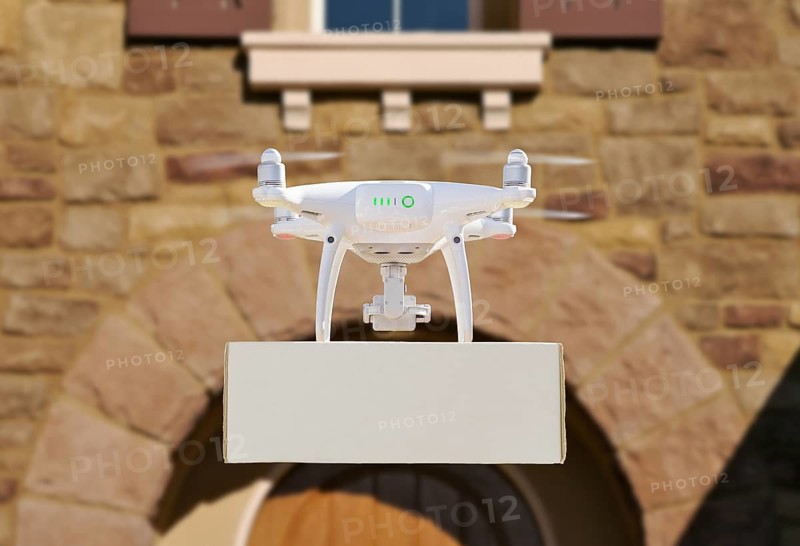 Drone Delivering Package to House Porch