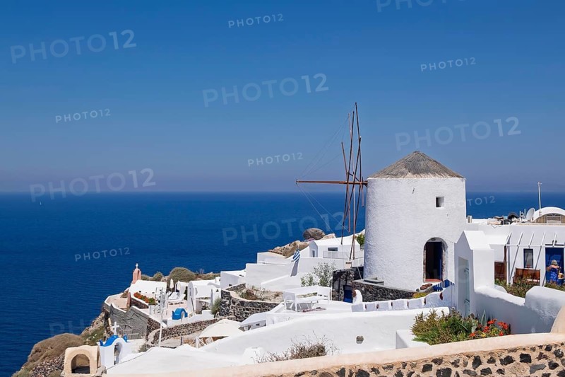 View over the town of Oia on the crater rim, Santorini, Cyclades, Greek island, Greece