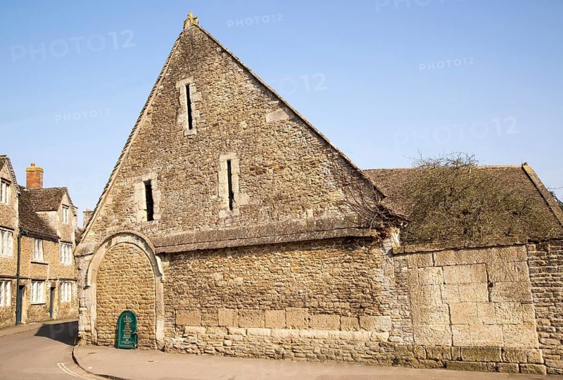 Historic tithe barn in the village of Lacock, Wiltshire, England, UK
