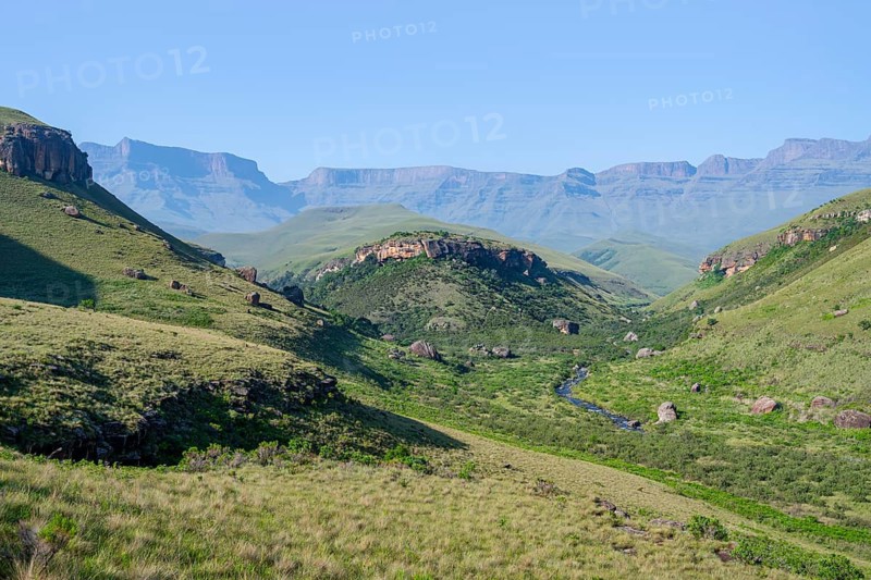 Green idyllic mountain valley with river, Giant's Castle, Maloti-Drakensberg Park, Drakensberg Mountains, South Africa