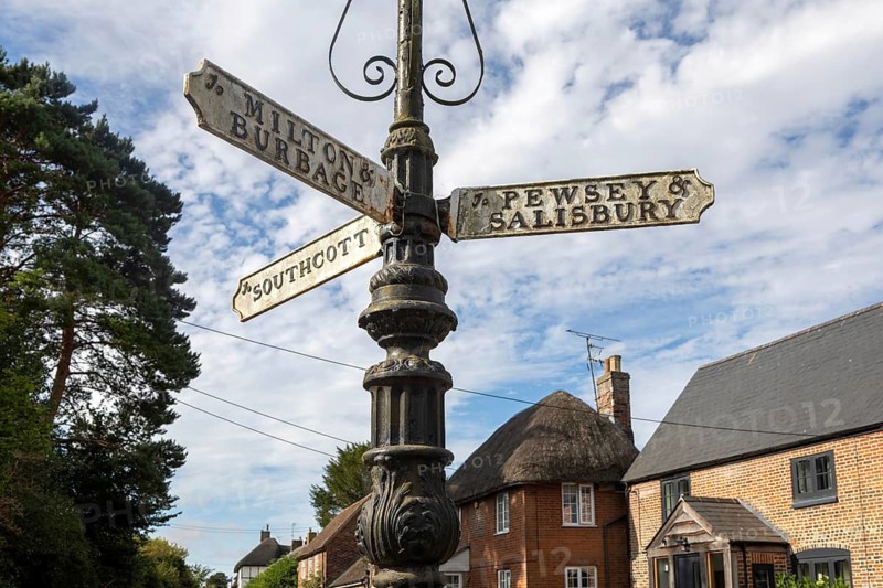 Vintage direction fingerpost pointer street sign in Pewsey, Wiltshire, England, UK