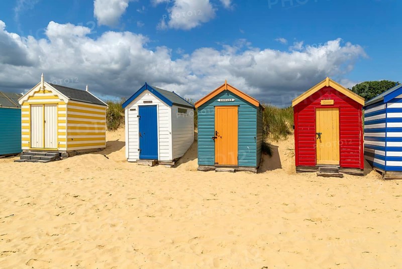Seaside beach huts on the seafront at Southwold, Suffolk, England, UK