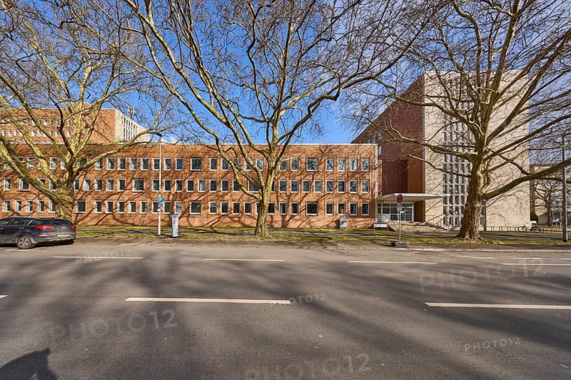 Lower Saxony Ministry of Social Affairs, Labour, Health and Equal Opportunities, brick building, commercial building, facade, windows, bare winter trees, parking strip, blue sky, street Gustav-Bratke-Allee, Hanover, state capital, Hanover region, Lower Saxony, Germany