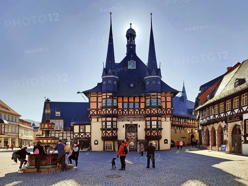 Market square with town hall backlit, Wernigerode, Harz, Saxony-Anhalt, Germany