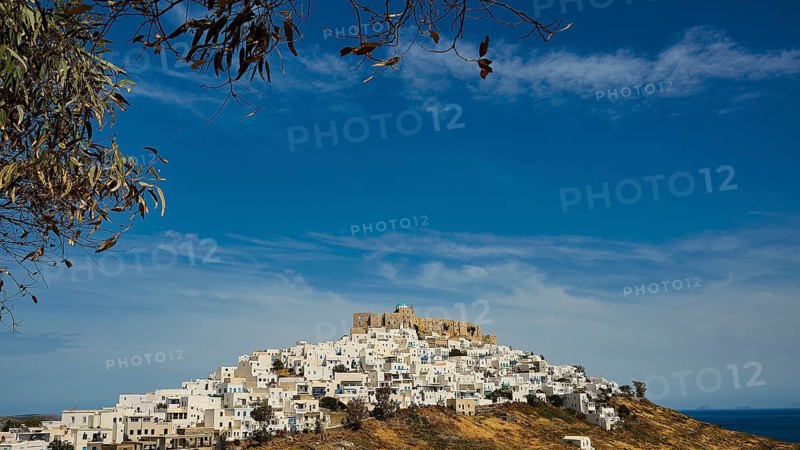 A village with white houses on a hill under a fortress, blue sky, Querini Castle, Chora, Astypalea, Dodecanese, Greek Islands, Greece
