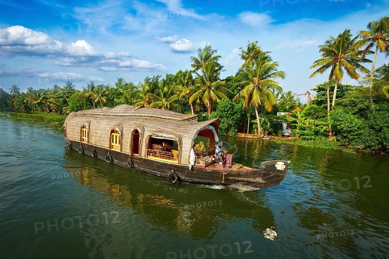 Tourism attraction of Kerala, tourist houseboat in Kerala backwaters. Kerala, India