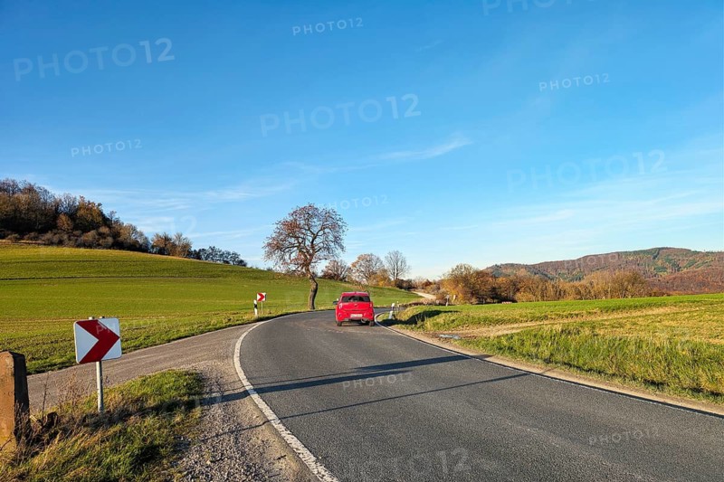 Country road through hilly, agricultural landscape, winding route, sunny autumn weather, Rühle, Bodenwerder, Rühler Switzerland, Vogler, Weser Hills, Lower Saxony, Germany