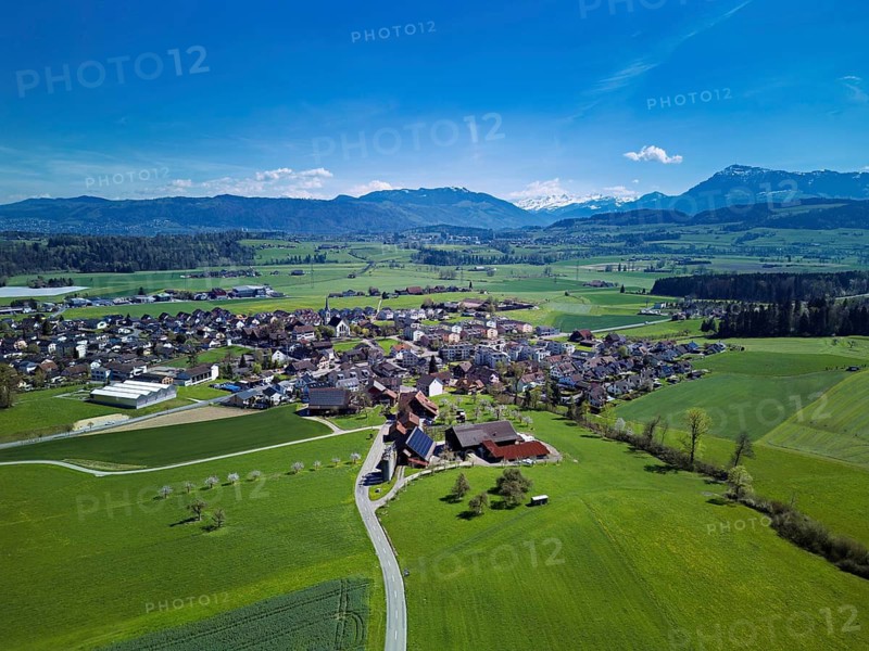View of the village with the Alps with the Rigi in the back, Oberrüti, Freiamt, Canton of Aargau, Switzerland