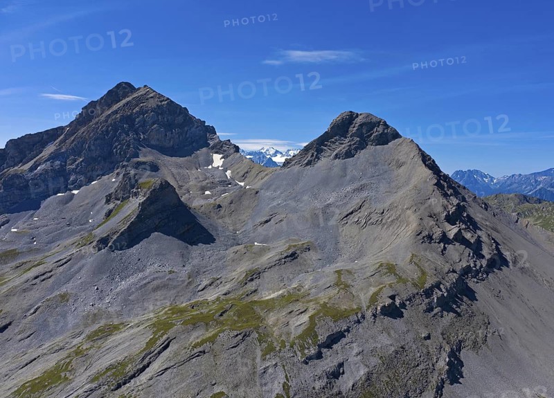 Impressive mountain range with the peaks Grand Chavalard, left, and Six du Doe at the mountain pass Col de Fenestral, Fully, Valais, Switzerland
