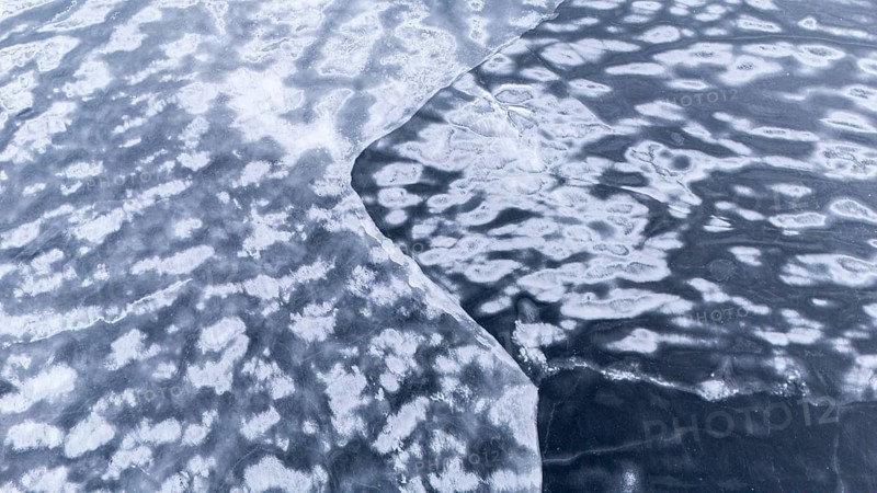 Frozen lake in early winter. Region of La Mauricie. Province of Quebec. Canada