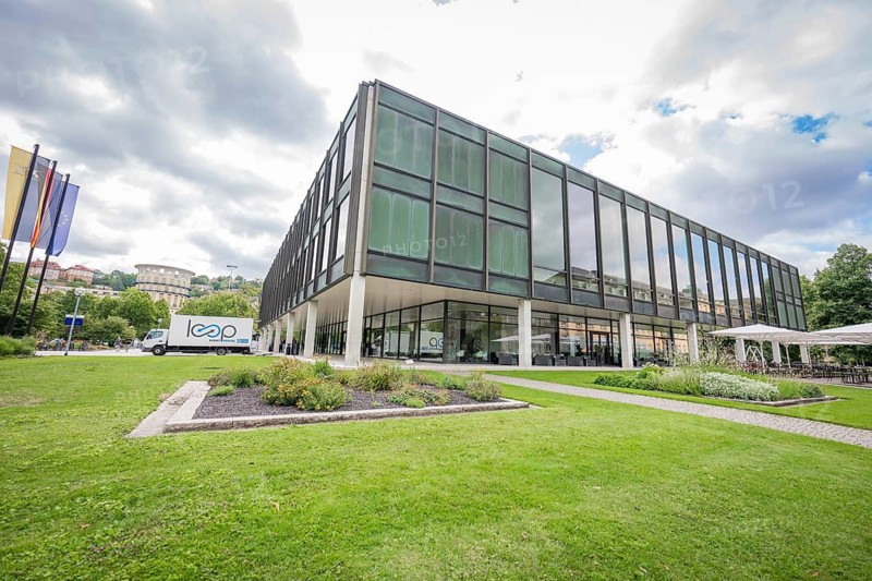 Green grass area in front of a modern building with glass façade, state parliament of Baden-Württemberg, Stuttgart, Germany