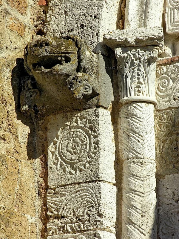 Historic stone carving, portal at the Romanesque Cathedral of St Peter and Paul, Romanesque and Gothic style cathedral, old town centre, Sovana, Sorano, Province of Grosseto, Tuscany, Italy