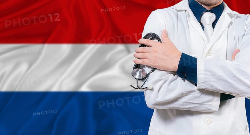 Dutch national health system, Medical professional holding sthetoscope isolated