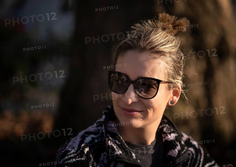 Young woman, portrait, blonde wearing sunglasses, enjoying sun, Stuttgart, Baden-Württemberg, Germany