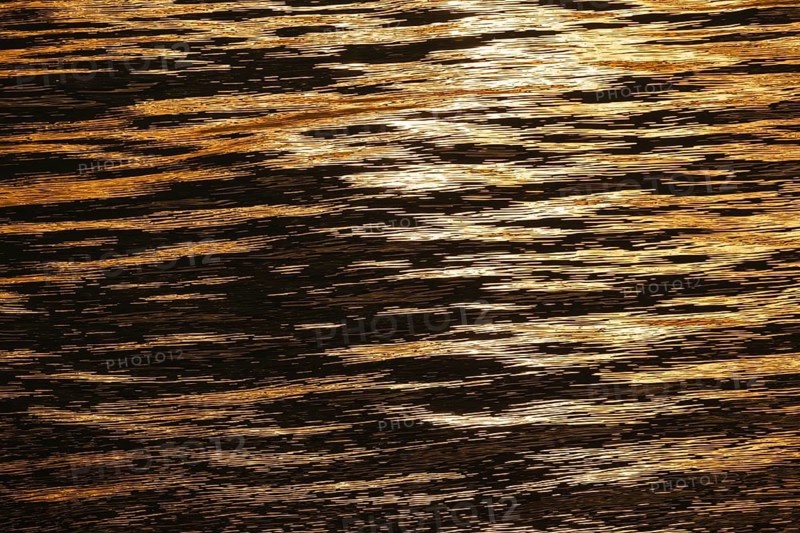 Sun rays are reflected on the sea surface, small waves, Baltic Sea