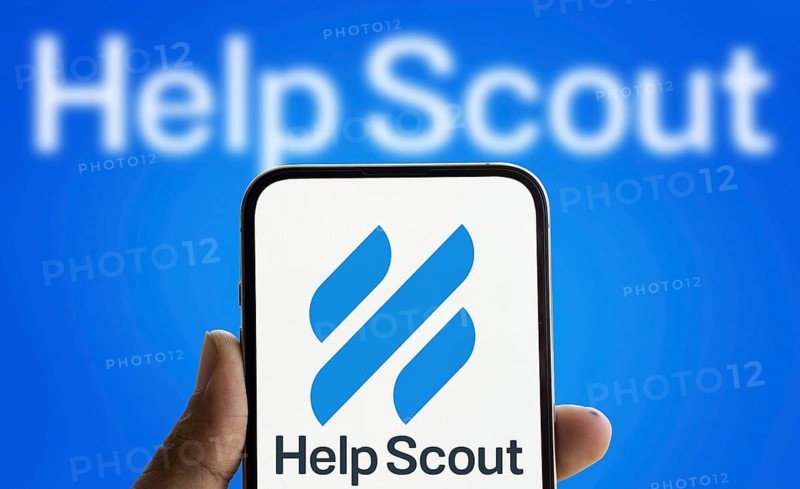 Help Scout logo is displayed on smartphone. Help Scout PBC is a global remote company