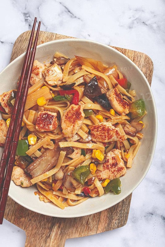 Fried noodles with chicken meat and vegetables, Bami Goreng, Indonesian dish, no people