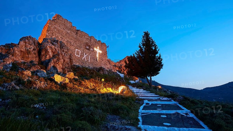 Night shot of a castle ruin with illuminated cross and tree, quiet and historical atmosphere, Archangelos, castle, place, castle of Archangelos, Rhodes, Dodecanese, Greek Islands, Greece