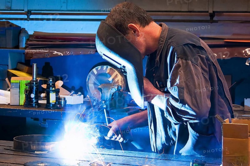 A welder working in his company's workshop, man, 35, 40, profession, professions, welder, Vienna, Austria