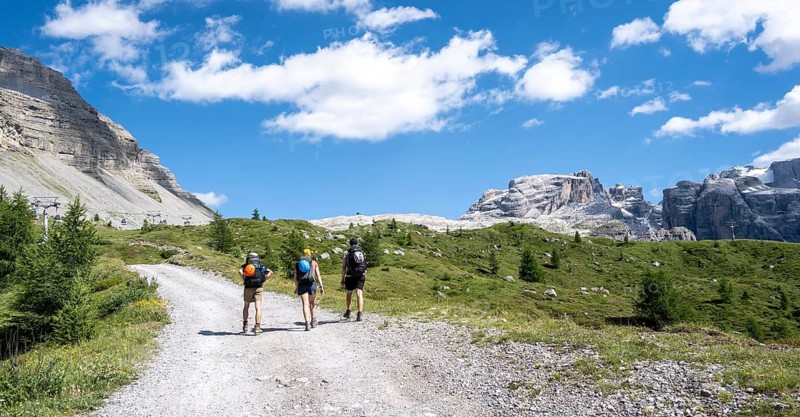 Hikers in front of Rifugio Graffer, Brenta, Brenta-Adamello Natural Park, Trentino, Italy