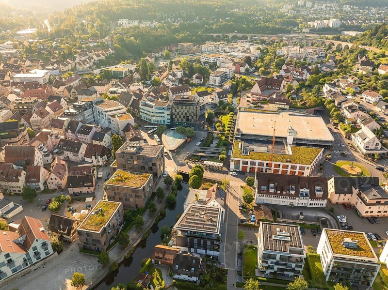 Aerial view of a town with mixed old and modern buildings and many green spaces, Nagold, Black Forest, Germany