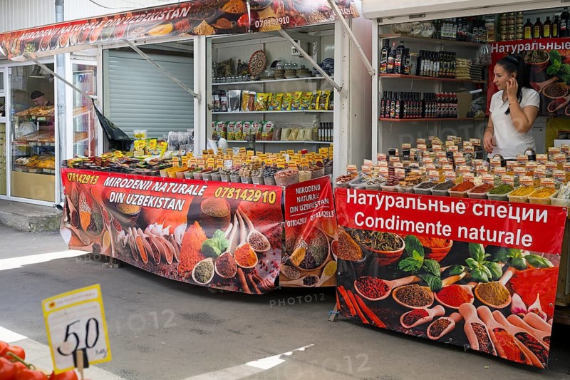 Outdoor stand with a wide selection of spices, vividly decorated and brightly lit, Central Market, Piata Centrala, Chisinau, Chisinau, Chisinau, Chisinau, Republic of Moldova, Moldova, Eastern Europe