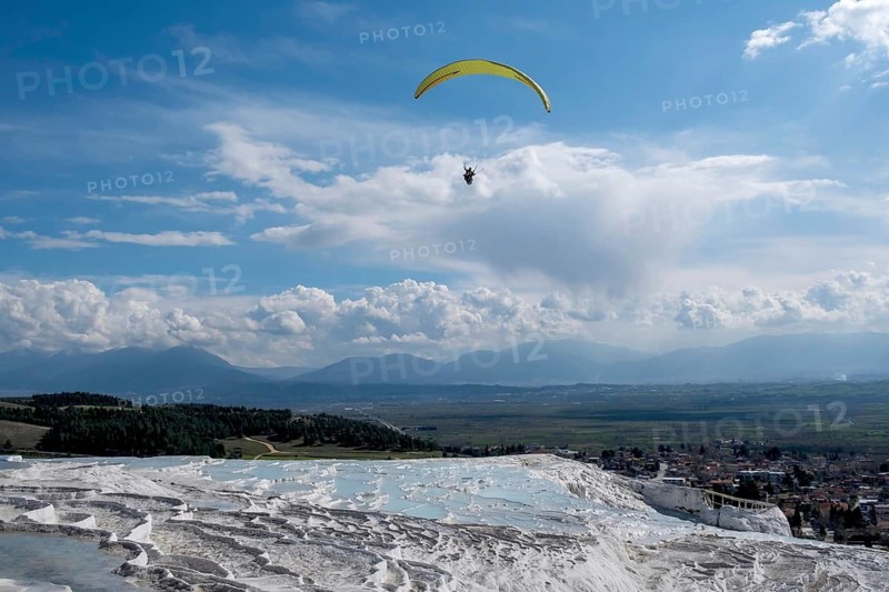 Sintered limestone terraces of Pamukkale, tandem paragliding, Pamukkale, Denizli province, Aegean region, Turkey
