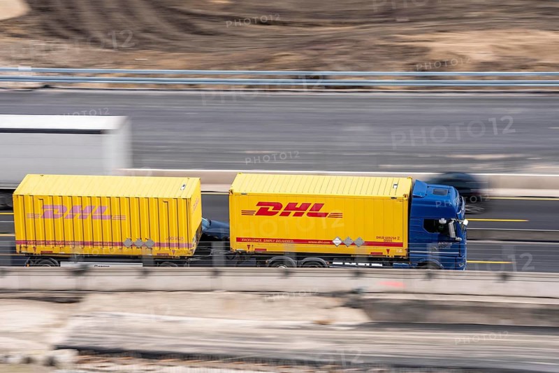 Freight truck from the parcel service provider DHL, Deutsche Post, on the motorway