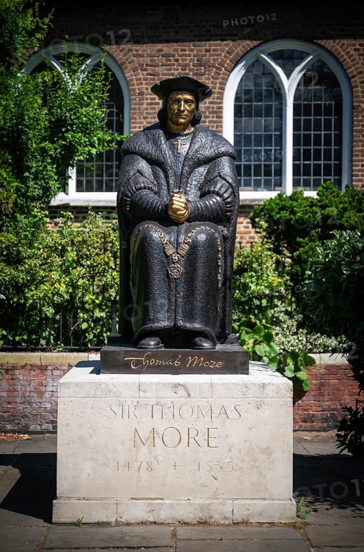 Statue of Sir Thomas More or Thomas Morus, English statesman and Renaissance humanist writer (1478–1535), Old Church, Chelsea Embankment, London, United Kingdom, England, United Kingdom