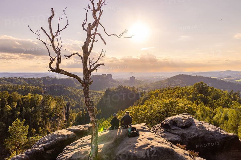Sunset on the Carola Rock in Saxon Switzerland View of the Schrammsteine, the Königstein Fortress, the Falkenstein and the Lilienstein, Bad Schandau, Saxony, Germany