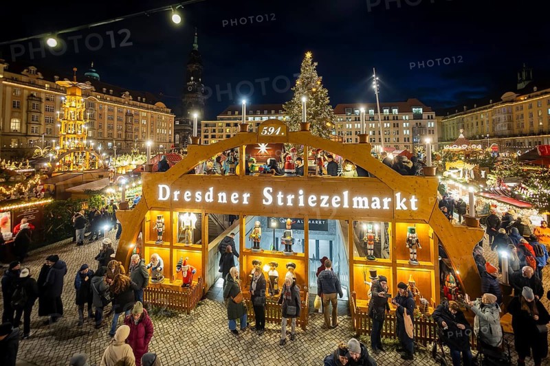 Dresden's Striezel Market has been held mostly on the Altmarkt since 1434 during Advent and attracts an average of around two million visitors a year. It is the oldest Christmas market in Germany, confirmed by a certificate. Großer begehbarer Schwibbogen, Dresden, Saxony, Germany