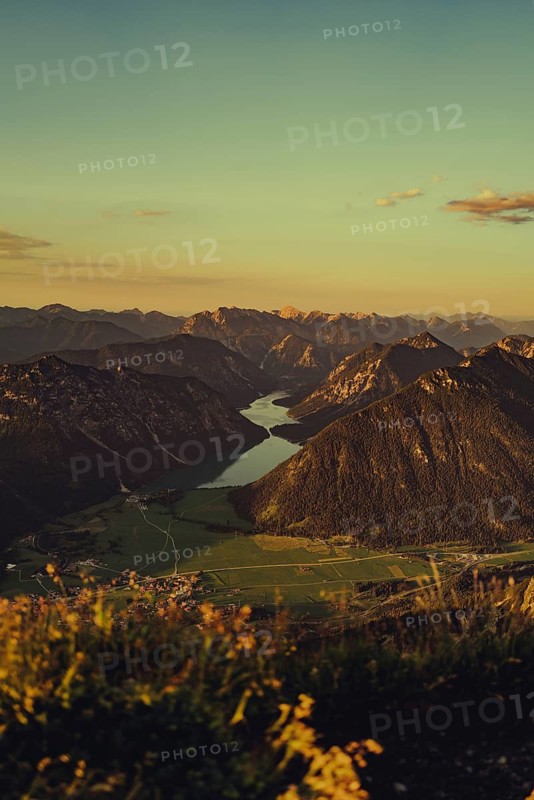 Thaneller summit at sunset in the Lechtal valley in Tyrol with a wonderful view of the surrounding mountains. Tyrol, Austria