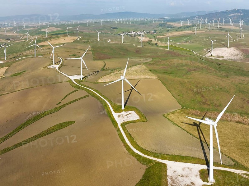 Windmills on a wind farm near Zahara de los Atunes, aerial view, drone shot, Cádiz province, Andalusia, Spain