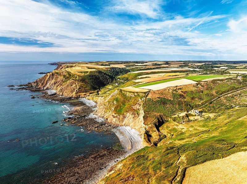 Cliffs and Fields over Welcombe Mouth Beach from a drone, North Devon and Cornwall Coastpath Border, Devon, England, Summer 2026