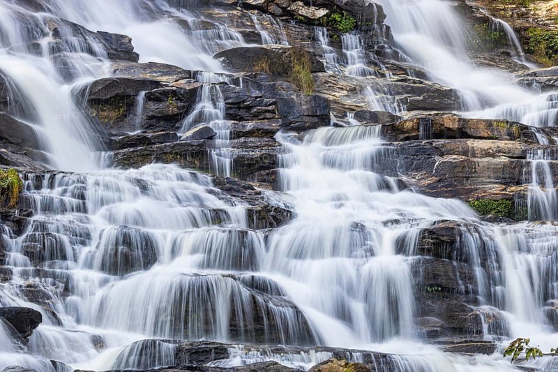 Mae Ya waterfall with cascading flowing water, near Doi Inthanon National Park, Chiang Mai Province, Thailand