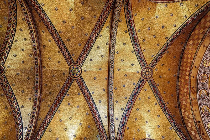 Gilded mosaic vaulting illuminate the apse of the Grade II listed Fitzrovia Chapel, London, England, United Kingdom