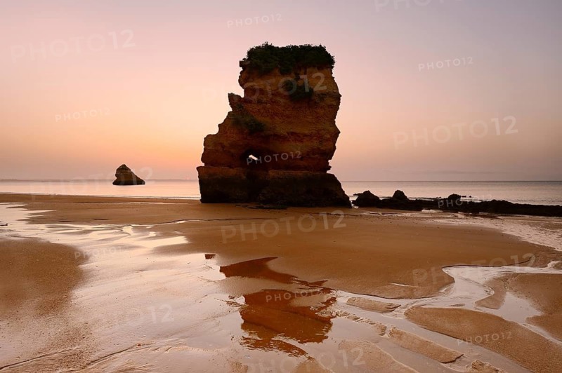 Rock formation on the beach at sunrise, Praia Dona Ana, Lagos, Algarve, Portugal