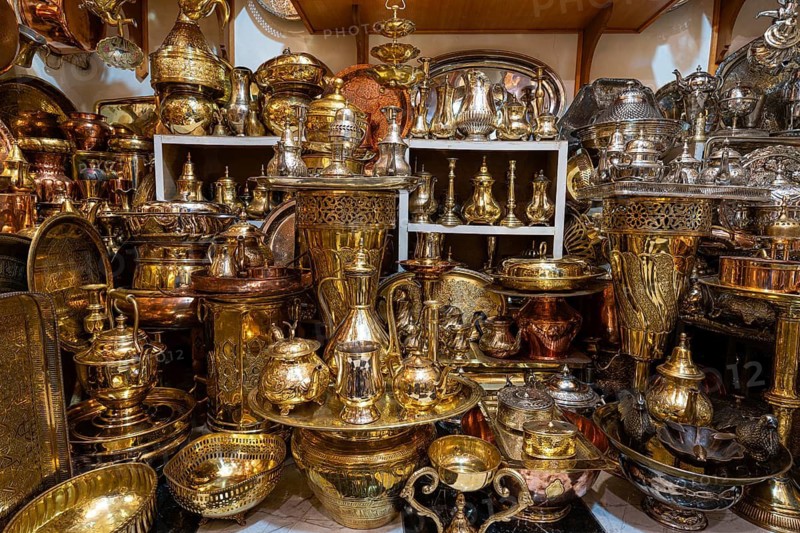 Brass and copper vessels on display for sale in a shop, Souk, Bazaar, Maghreb, Marrakech, Morocco, North Africa