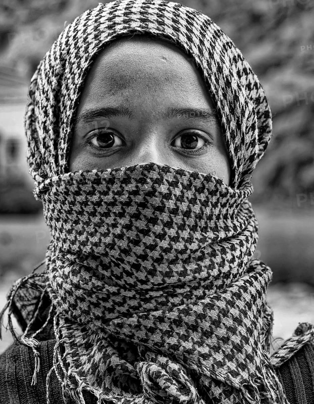 Portrait of a young Moroccan woman, veiled, headscarf, Palestinian, Berber, b/w photo, black and white, Morocco