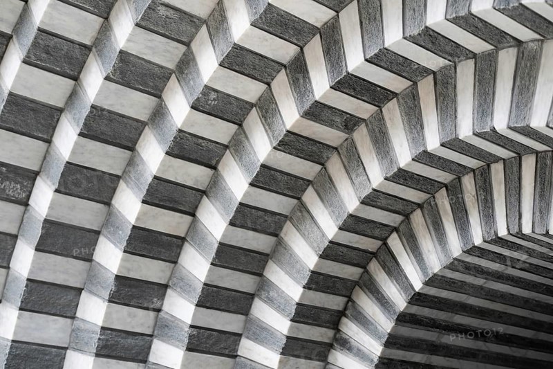 Marble and gneiss alternating in layers, round arch approach, interior, Roman Catholic church of San Giovanni Battista, built in the same place as the village church destroyed by avalanche in 1986, architect Mario Botta, Mogno, Maggia Valley, Valle Maggia, municipality of Lavizzara, Canton of Tessin, Switzerland