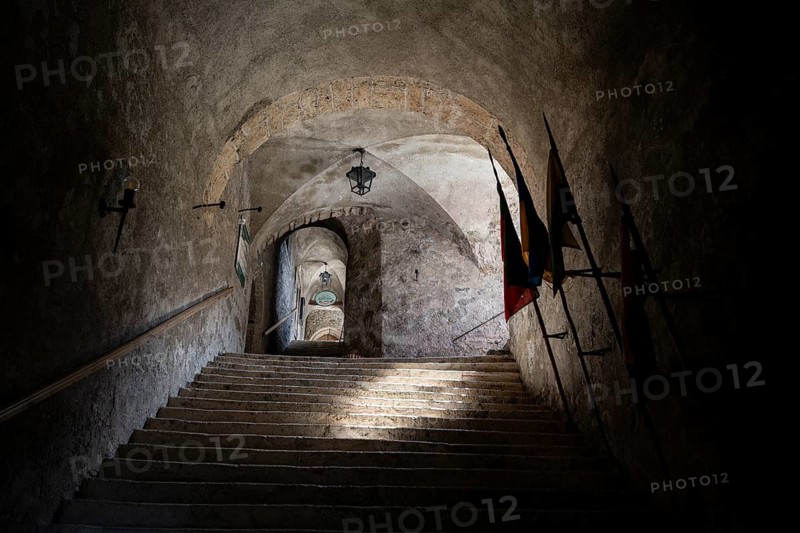 Stairway with flags, Hohenwerfen Fortress, Werfen, Pongau, Salzburg state, Austria