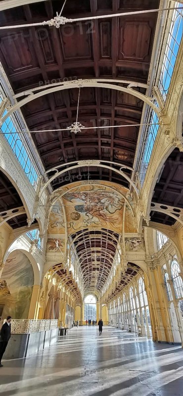 Impressive arcades with high ceilings, decorated with ornate frescoes. Elegant historical architecture, Maxim Gorky Kollonade, Marianske Lazne main collonade, Marienbad, Czech Republic