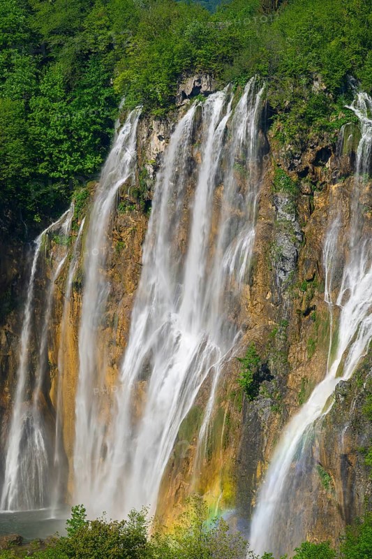 A rainbow over the Veliki Slap Waterfall. The highest waterfall in the Plitvice National Park is the large waterfall known as Veliki slap in Croatian. It is 78 meters high. Plitvice Lakes National Park, Croatia