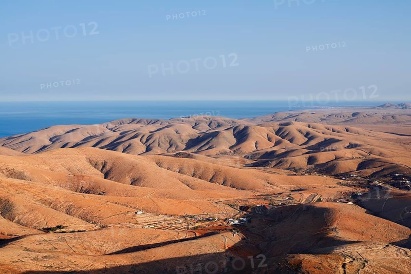 View of the barren and eroded landscape from the Mirador Corrales de Guize viewpoint, Fuerteventura, Canary Islands, Spain