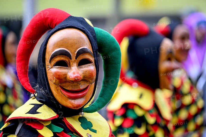 Member of a fools' guild in traditional Haes, fools' clothes, during the carnival procession in Achern, Ortenaukreis, Baden-Württemberg, Germany