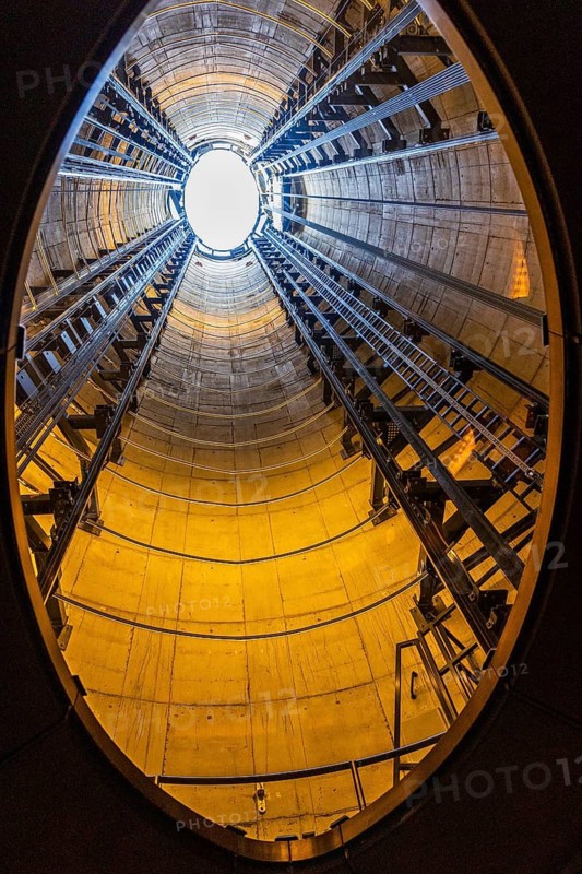 Looking up inside the disused chimney flue of Battersea Power Station, London, United Kingdom