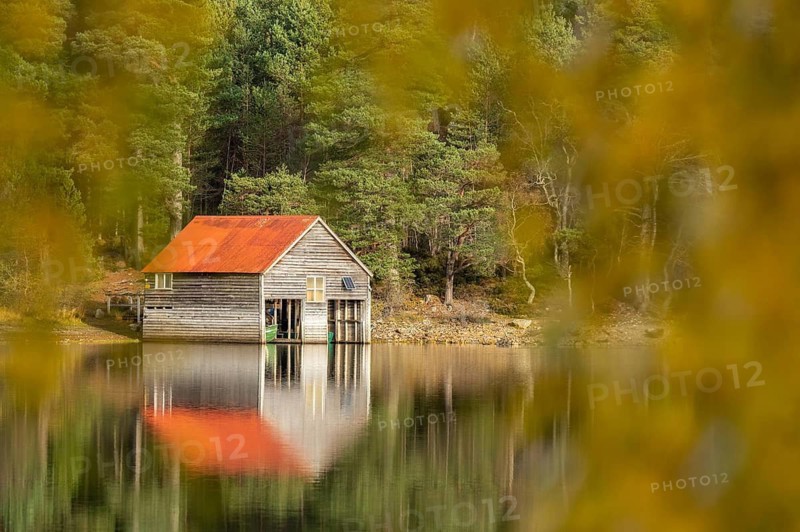 Boathouse on the shores of a lake in Scotland, Aviemore, Scotland, Great Britain